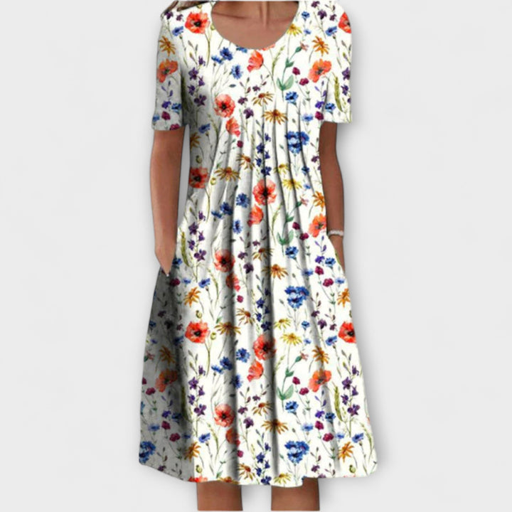 Emelie – Stilne plise obleke z nadzorom trebuha