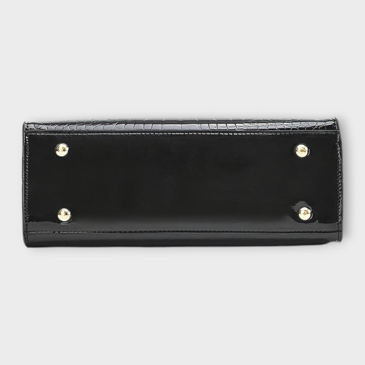 Cécile. - Sijajna torbica z vzorom krokodila